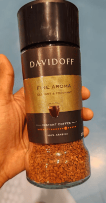 Regular coffee glass jar with brown and black label